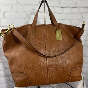 COACH purse with handles and a strap.  Inside zipper.  17”x13.5”.